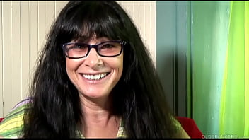 Mature sweetie discussing taboo topics while pleasuring herself