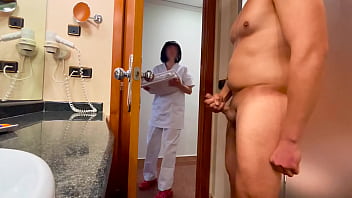 I stumble upon a maid in the act of cleaning the rest room and assist her in reaching ejaculation
