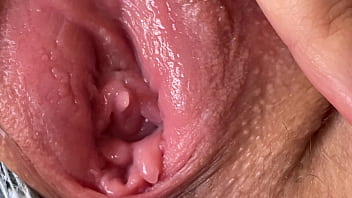 Powerful close-up of a nubile girl's humid and luscious poon as she prepares for penetration